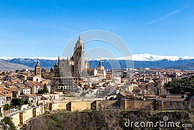 Segovia, Spain â€“ View of the Cathedral and the Sierra the Guadarrama behind in Winter Stock Photo